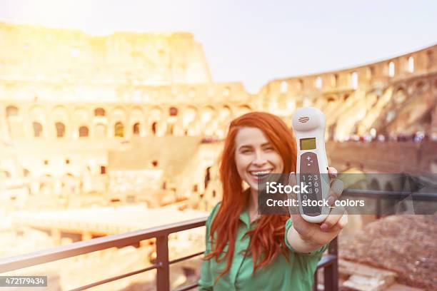 Tourist With Phone In Colloseum Stock Photo - Download Image Now - 2015, Adult, Adults Only