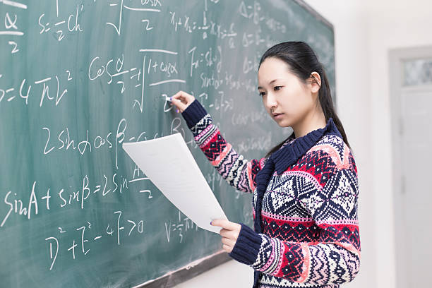 istock College students to write formulas on the blackboard 472179981