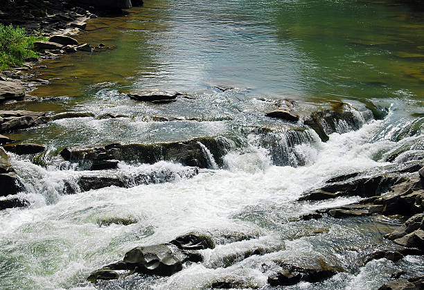 mountain river - natural phenomenon waterfall rock tranquil scene stock-fotos und bilder