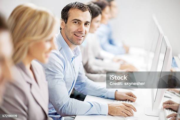 Business People On A Computer Class Stock Photo - Download Image Now - Business, Computer Lab, Computer Monitor