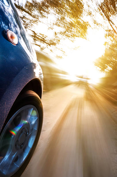 istock car on the road with motion blur background. 472180191