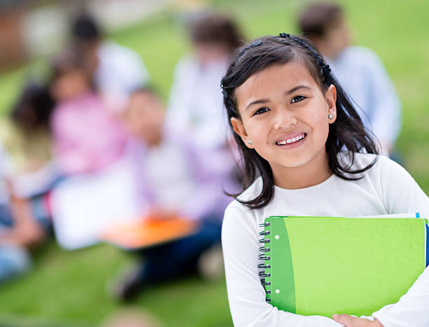 istock Happy girl at the school 472180985