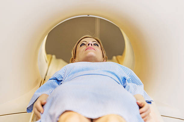 istock Female patient at MRI Scan. 472181479