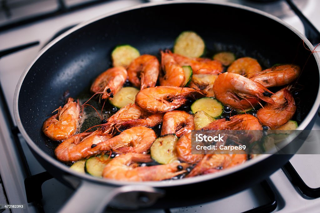 shrimp and zucchini in cooking Animal Shell Stock Photo