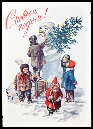 Moscow, Russia - March 3rd, 2011: Vintage greeting postcard printed in former Soviet Union features group of children preparing for celebrating of the New Year's Day