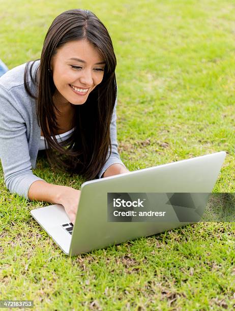Woman With A Laptop Outdoors Stock Photo - Download Image Now - Adult, Adults Only, Beautiful People