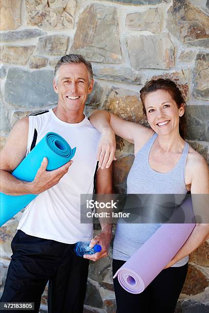 Theyre Passionate About Their Yoga Classes Stock Photo - Download Image Now - 50-59 Years, Active Lifestyle, Activity