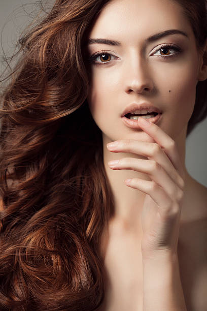 istock Young beautiful woman 472185551