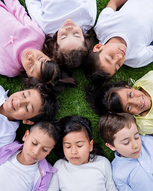 istock Group of children in a circle 472185685