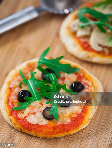 Mini Pizza Stock Photo - Download Image Now - Arugula, Baked, Basil