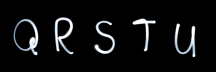 Q, R, S, T, U - Pictured by light letters. on black