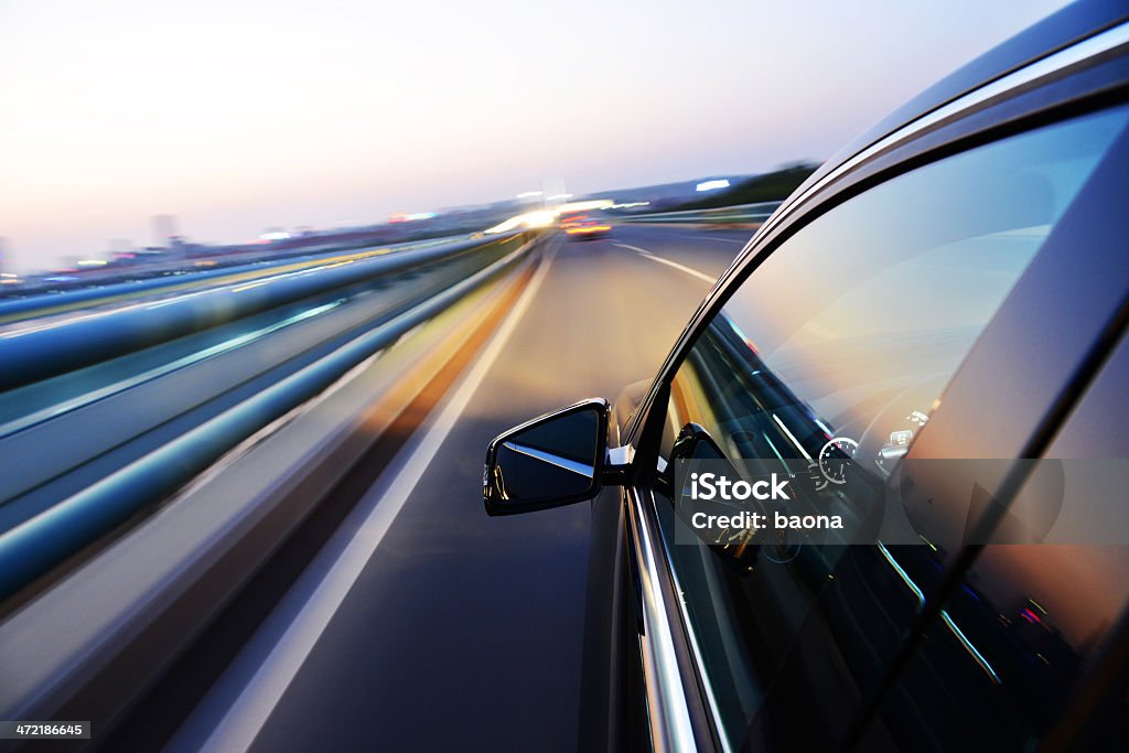 Driving at night Car driving through the city at night. Abstract Stock Photo