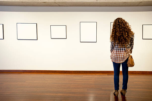 istock Young Woman in Art Gallery 472187125