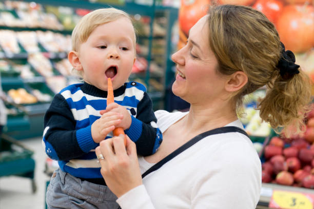 istock Mother and son in a supermarket 472187293