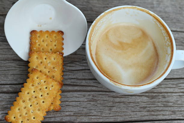 istock latte coffee in glass and crackers 472188400