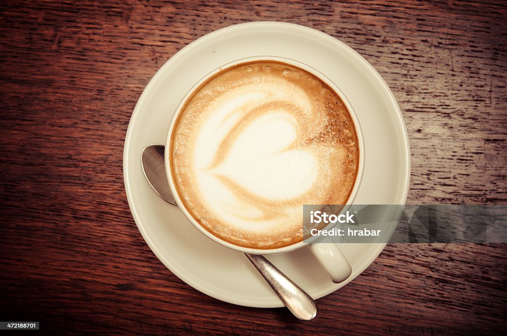 cappuccino cup cappuccino cup on wooden table in cafe Coffee - Drink Stock Photo