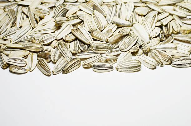 Seeds of sunflower Seeds of sunflower isolate on white background cerial stock pictures, royalty-free photos & images