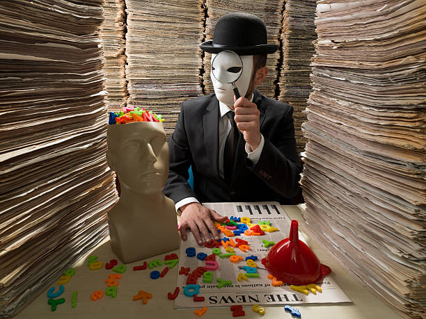 istock Man with mask holding magnifying glass, reading newspaper , censorship concept 472189229