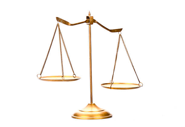 istock Golden brass scales of justice. 472189607
