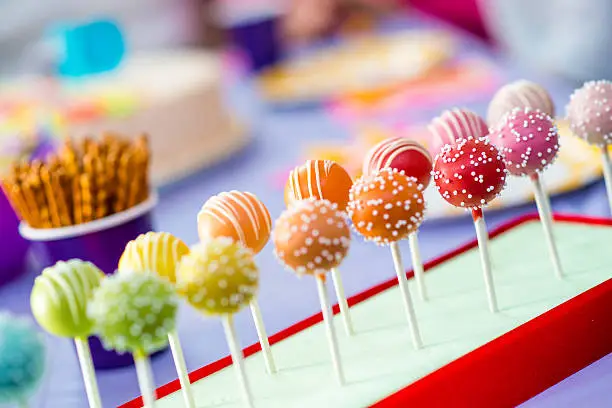 Group of coloured lollipops on the table.