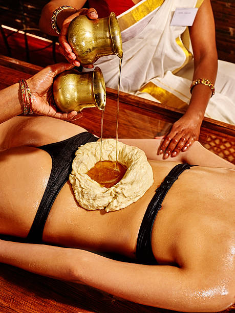 istock Woman having Ayurvedic spa treatment 472191824