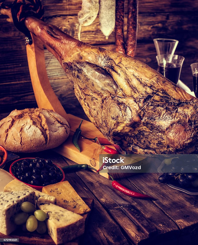 tapas Pata negra with olives, bread and premium quality cheese Antipasto Stock Photo