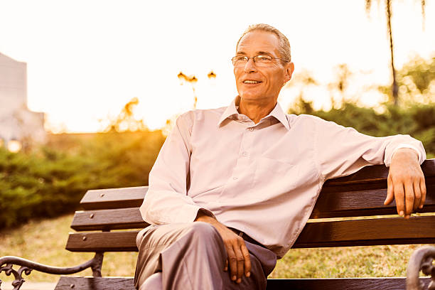 istock Smiling businessman at sunset. 472193357