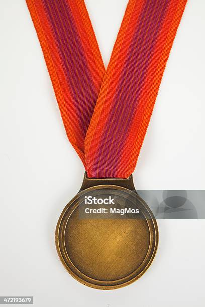 Gold Medal Isolated On White Background Stock Photo - Download Image Now - Achievement, Award, Award Ribbon