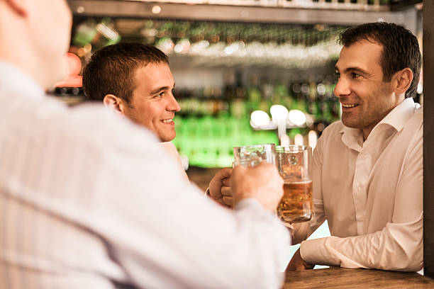 istock Businessmen toasting with beer. 472195273