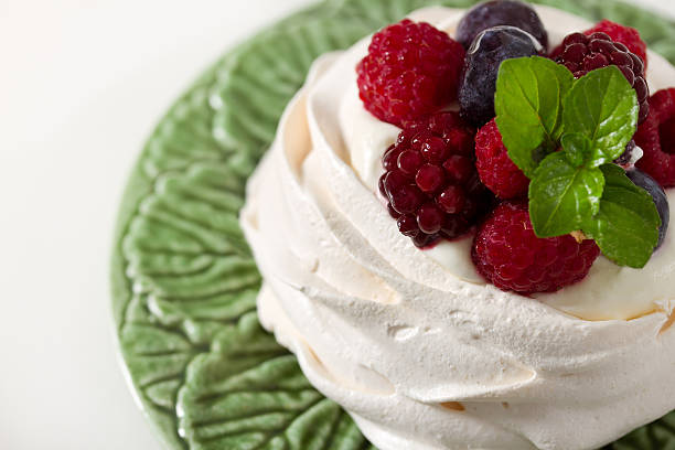 istock Meringue and red fruits dessert 472196339