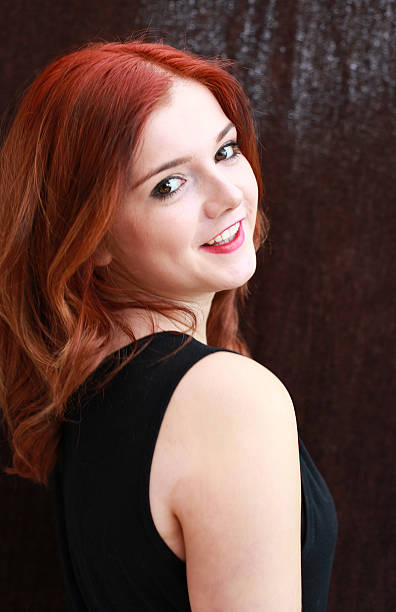 istock Pretty red headed girl 472196594