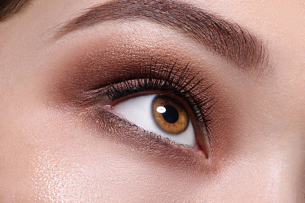 istock Glamour brown eye make up close 472196738