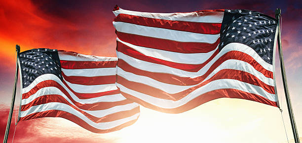 istock us national flag waving for holiday 472196860