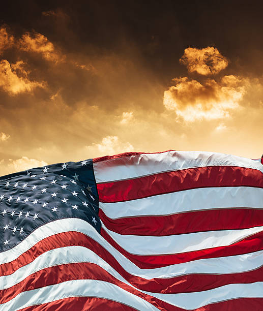 istock us national flag waving for holiday 472196866
