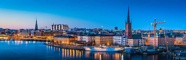istock Stockholm Gamla Stan waterfront panorama illuminated at dusk Sweden 472196884