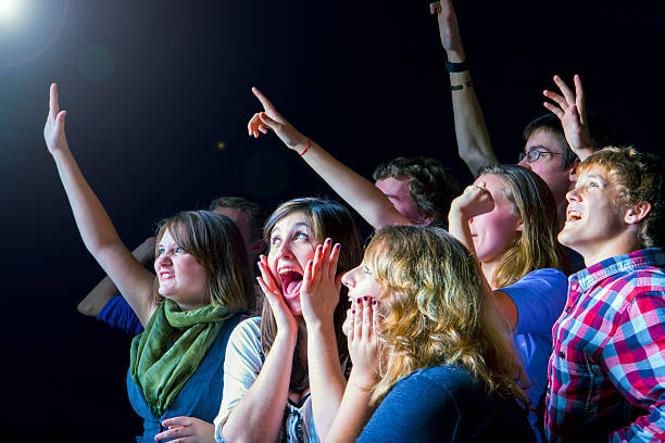 istock Teens Going Crazy at a Concert 472197693