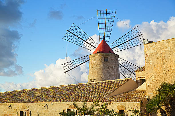 istock Windmill at Sunset in Trapani-Italy salterns 472197931