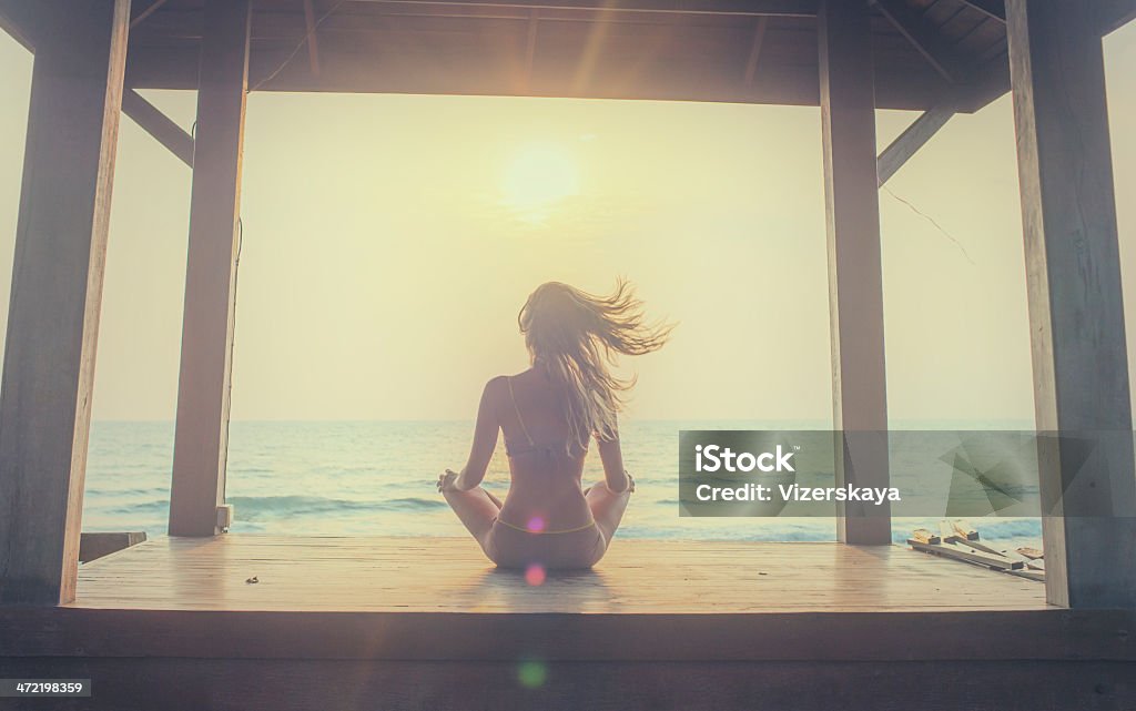 yoga meditation at sunset Chakra Stock Photo