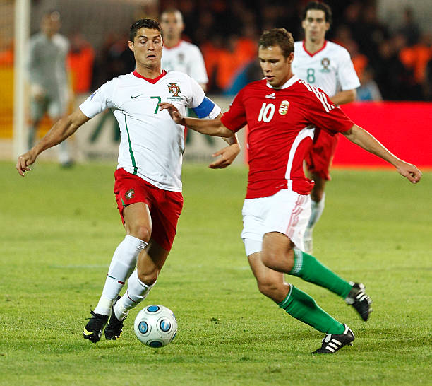 Hungary vs. Portugal Budapest, Hungary - September 9, 2009: Portuguese Cristiano Ronaldo (L) and Hungarian Krisztian Vadocz (R) are fighting for the ball during Hungary vs. Portugal football match at Puskas Ferenc Stadium on 9th September 2009, in Budapest, Hungary. offside stock pictures, royalty-free photos & images