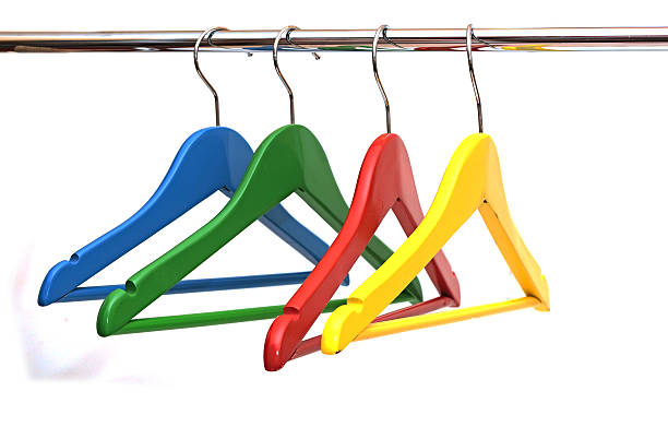 istock colorful coats hanger isolated on white 472203409