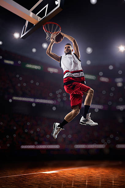 istock red Basketball player in action 472203774