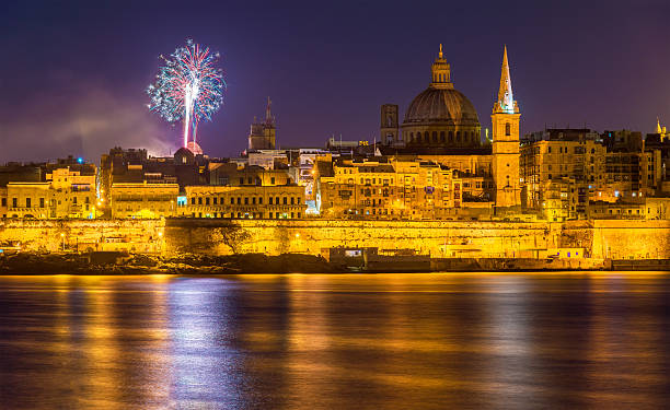 View of Valletta with fireworks on Easter 2015 - Malta View of Valletta with fireworks on Easter 2015 - Malta valletta photos stock pictures, royalty-free photos & images