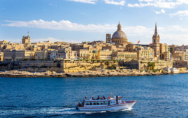 istock Passenger boat passing Marsamxett Harbour in Malta 472203962
