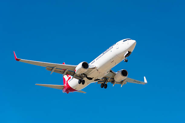 Hobart, Australia- Mar 13 2014: Image of a Qantas passenger airliner landing at Hobart Airport