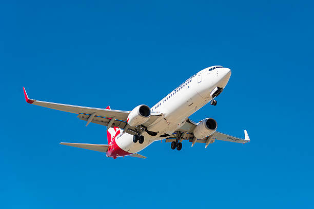 Qantas passenger airplane landing stock photo