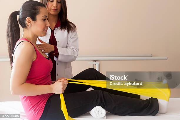 Patient Doing Some Special Exercises Stock Photo - Download Image Now - 25-29 Years, Adult, Adults Only