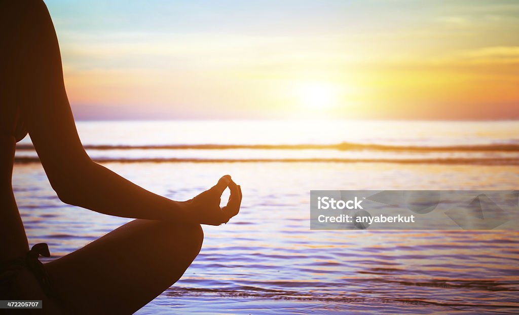 yoga meditation on the beach Yoga Stock Photo