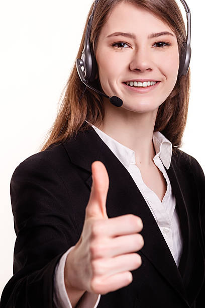 istock Portrait of smiling support phone operator in headset 472206982