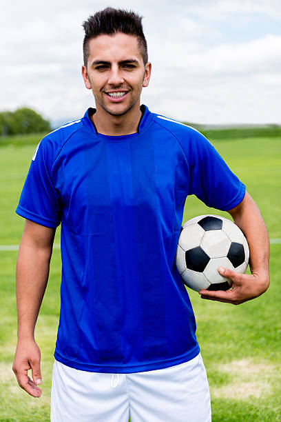 istock Happy football player 472208815