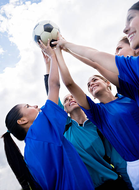 istock Football team celebrating a goal 472208911